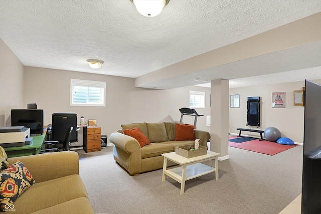 8030 Parcrest Ct, Indianapolis, IN 46259 - carpeted living room with a textured ceiling and an office area