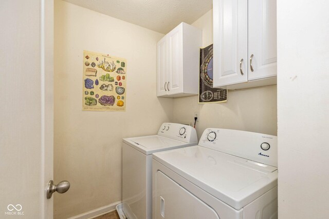 29 Northview Dr, Danville, IN 46122 - laundry area with washer and dryer, cabinet space, and baseboards