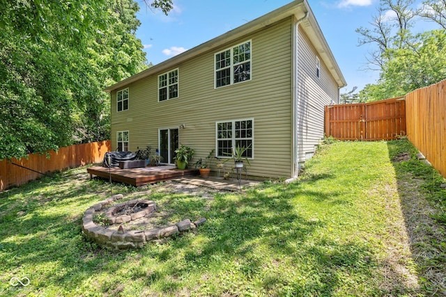 29 Northview Dr, Danville, IN 46122 - back of property with a fire pit and a wooden deck