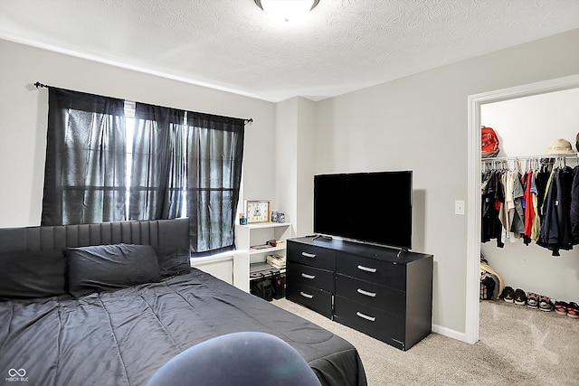 3428 Thomas Jefferson St, Westfield, IN 46074 - bedroom featuring a spacious closet, carpet floors, a closet, a textured ceiling, and baseboards