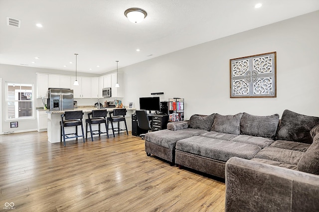 3428 Thomas Jefferson St, Westfield, IN 46074 - living room with light wood-style flooring and recessed lighting