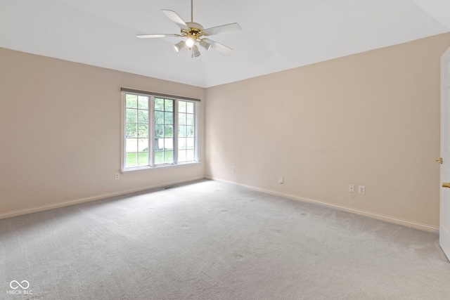 9175 Lakewind Dr, Indianapolis, IN 46256 - empty room with vaulted ceiling, ceiling fan, and carpet flooring