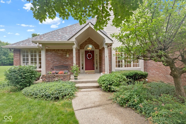 9175 Lakewind Dr, Indianapolis, IN 46256 - view of front of house with brick siding and roof with shingles