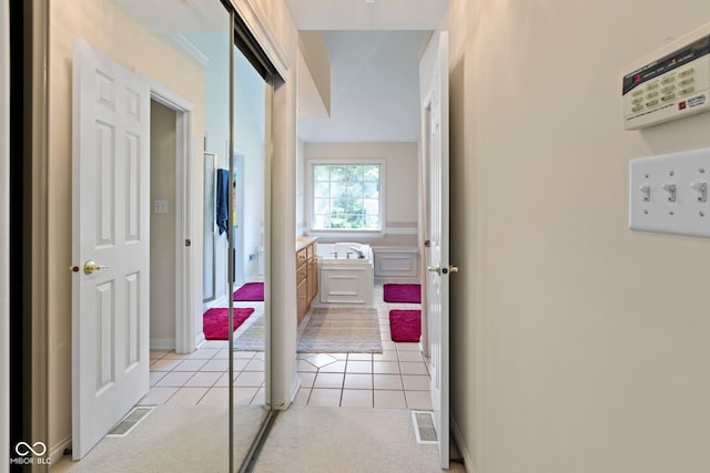 9175 Lakewind Dr, Indianapolis, IN 46256 - hall featuring light tile patterned floors