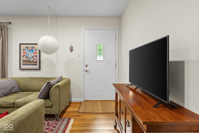 2233 Washington St, Columbus, IN 47201 - living area with light wood-type flooring and baseboards