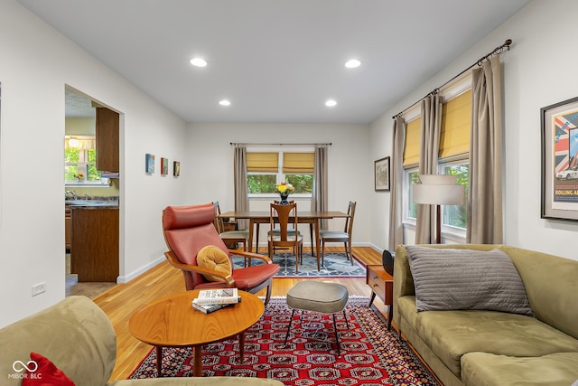 2233 Washington St, Columbus, IN 47201 - living area with light wood-type flooring, recessed lighting, and baseboards