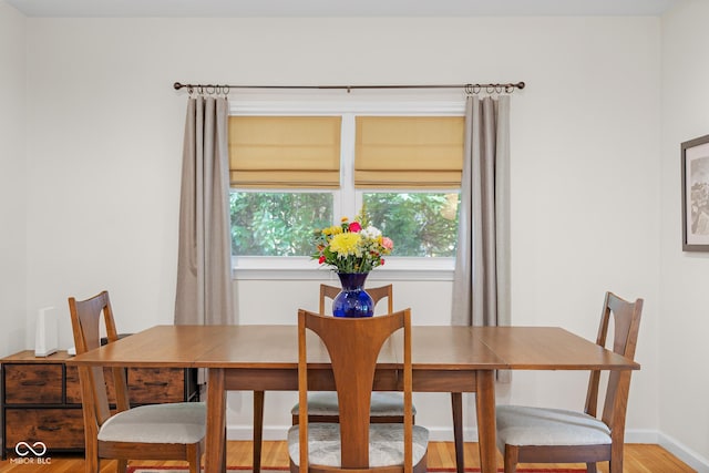 2233 Washington St, Columbus, IN 47201 - dining area featuring light wood-style flooring and baseboards