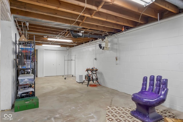 2233 Washington St, Columbus, IN 47201 - unfinished basement with concrete block wall