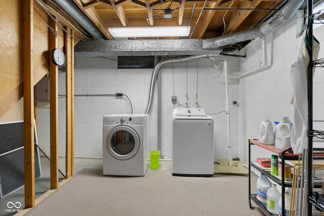 2233 Washington St, Columbus, IN 47201 - washroom with independent washer and dryer, electric panel, and carpet flooring