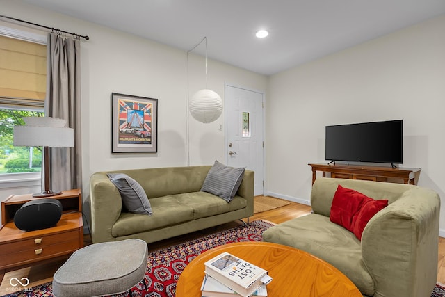 2233 Washington St, Columbus, IN 47201 - living area with wood finished floors, recessed lighting, and baseboards