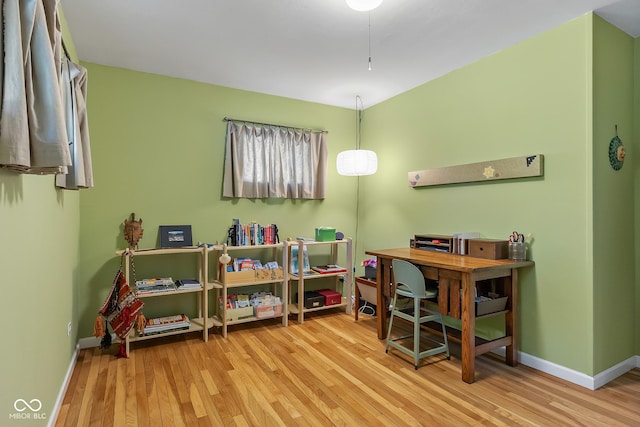 2233 Washington St, Columbus, IN 47201 - home office with wood finished floors and baseboards