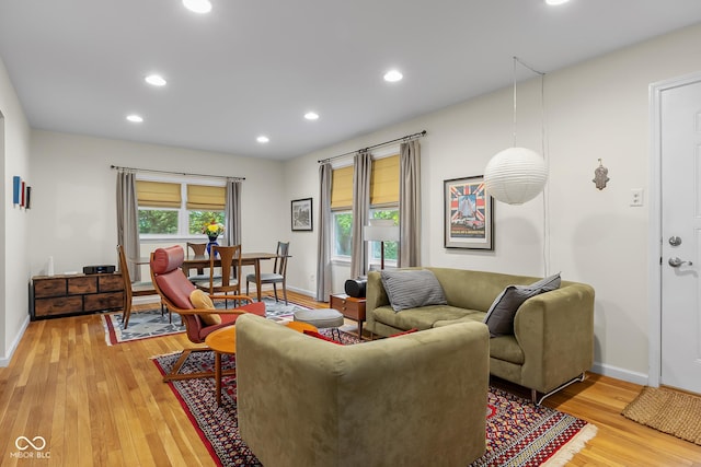 2233 Washington St, Columbus, IN 47201 - living room featuring light wood-type flooring, baseboards, and recessed lighting