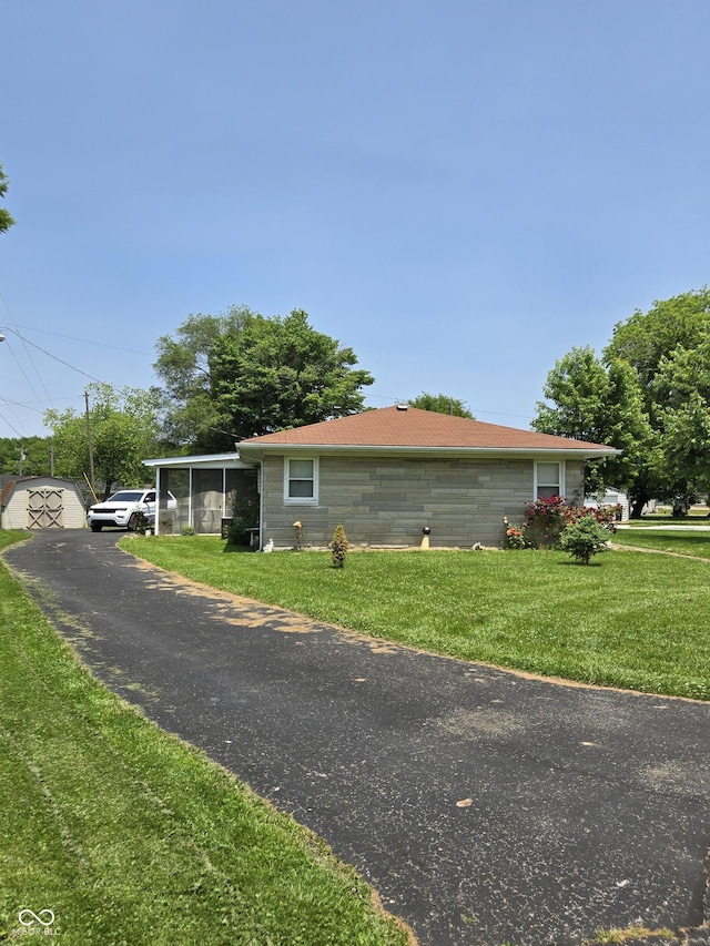 104 Meadow Ln, North Vernon, IN 47265 - view of property exterior featuring a lawn