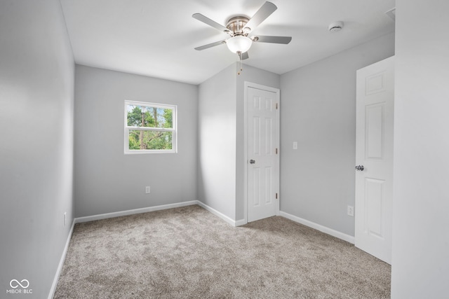 110 E Mcdonald St, Brazil, IN 47834 - unfurnished bedroom featuring carpet floors, baseboards, and ceiling fan