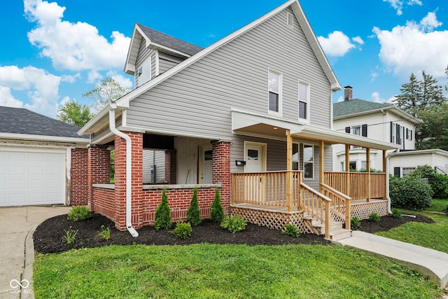 110 E Mcdonald St, Brazil, IN 47834 - view of front of property with covered porch, a front yard, brick siding, driveway, and a shingled roof