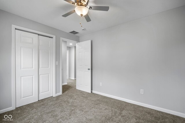 110 E Mcdonald St, Brazil, IN 47834 - unfurnished bedroom with carpet floors, a closet, baseboards, and ceiling fan