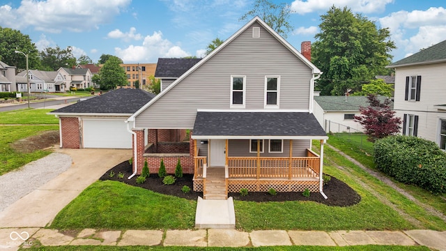 110 E Mcdonald St, Brazil, IN 47834 - view of front of property featuring covered porch, a front yard, driveway, a residential view, and brick siding