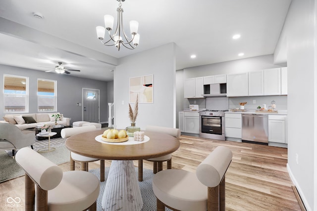 110 E Mcdonald St, Brazil, IN 47834 - living area with light wood finished floors, recessed lighting, ceiling fan, a chandelier, and baseboards