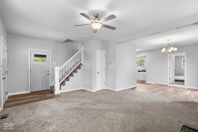 110 E Mcdonald St, Brazil, IN 47834 - entryway with carpet, stairs, ceiling fan, and baseboards
