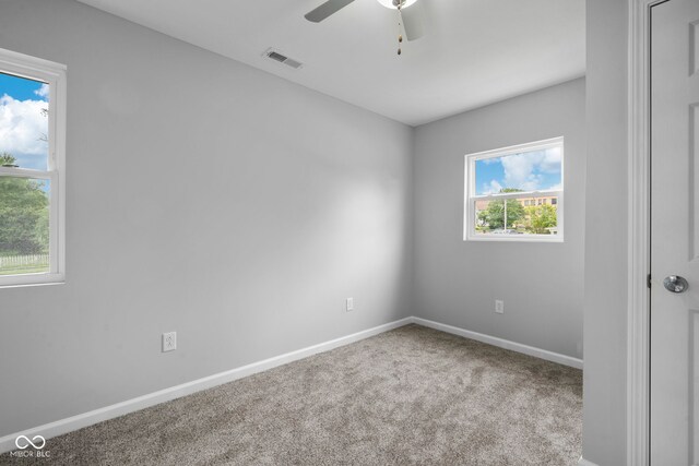 110 E Mcdonald St, Brazil, IN 47834 - spare room with carpet flooring, baseboards, and ceiling fan