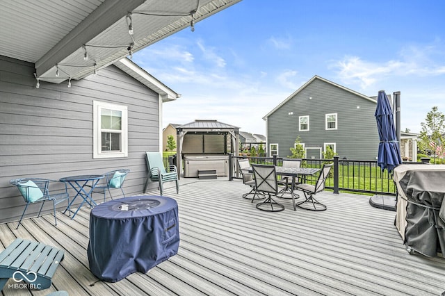 1107 Mccray Ln, Westfield, IN 46074 - deck featuring a hot tub, outdoor dining area, and a gazebo