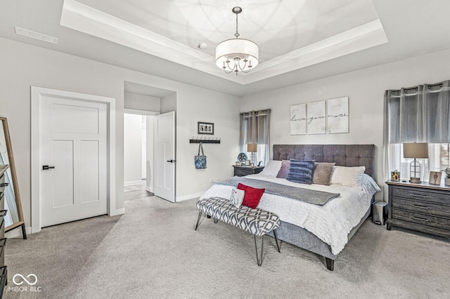 1107 Mccray Ln, Westfield, IN 46074 - bedroom featuring a raised ceiling, carpet flooring, a chandelier, and baseboards