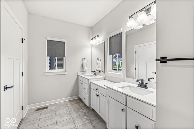 1107 Mccray Ln, Westfield, IN 46074 - full bathroom with two vanities and baseboards