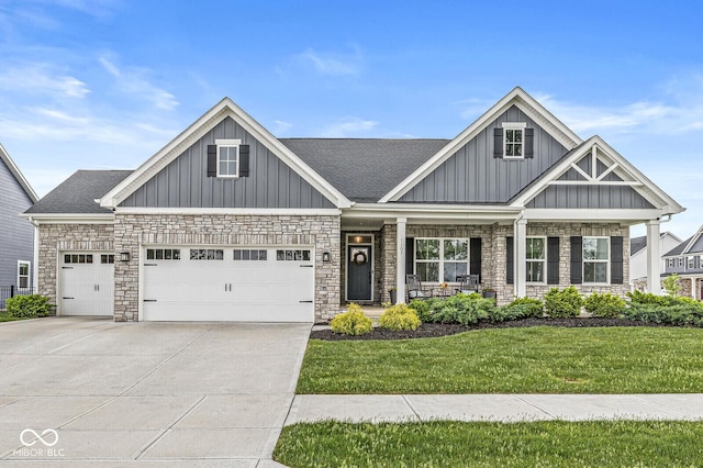 1107 Mccray Ln, Westfield, IN 46074 - craftsman inspired home featuring covered porch, a front yard, a garage, and board and batten siding