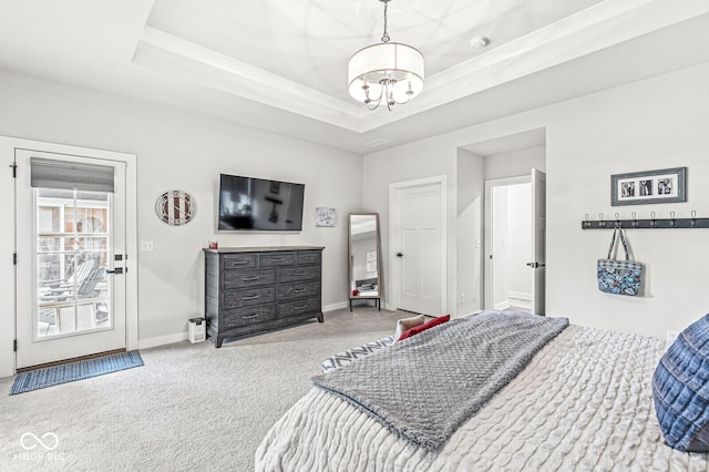 1107 Mccray Ln, Westfield, IN 46074 - carpeted bedroom featuring a chandelier, baseboards, and a raised ceiling
