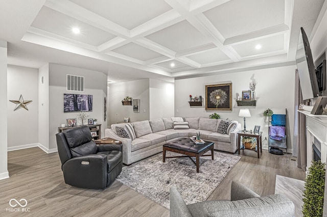 1107 Mccray Ln, Westfield, IN 46074 - living area featuring light wood-style flooring, coffered ceiling, beam ceiling, baseboards, and recessed lighting