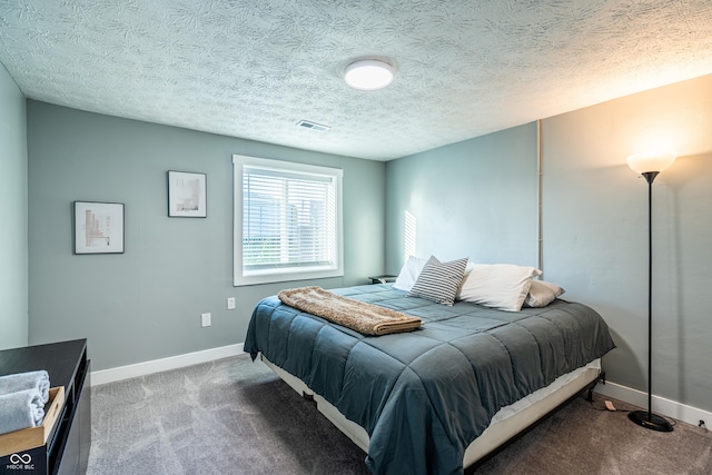1631 Columbia Ave, Indianapolis, IN 46202 - carpeted bedroom featuring baseboards and a textured ceiling