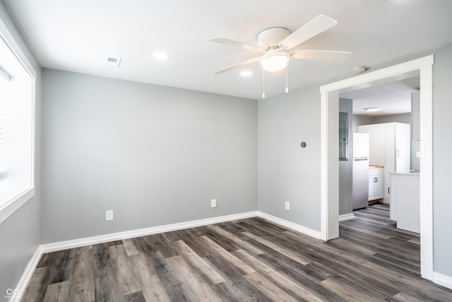 1631 Columbia Ave, Indianapolis, IN 46202 - unfurnished room with dark wood-style floors, baseboards, a ceiling fan, and recessed lighting