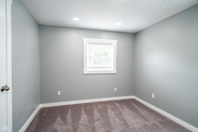 1631 Columbia Ave, Indianapolis, IN 46202 - unfurnished room featuring carpet, baseboards, and recessed lighting