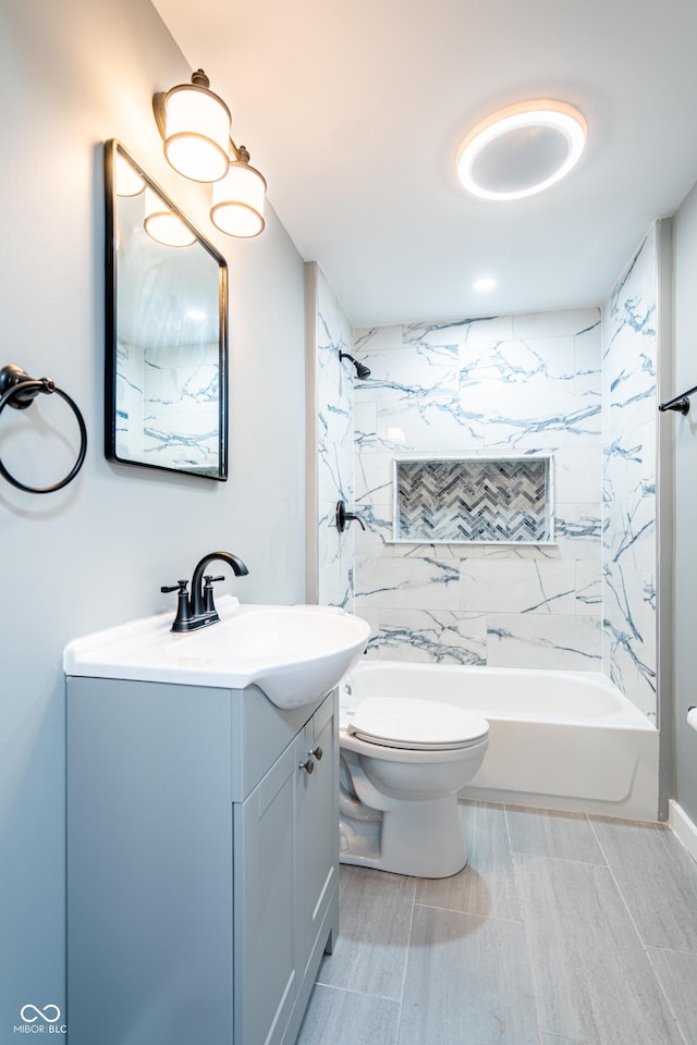 1631 Columbia Ave, Indianapolis, IN 46202 - bathroom featuring vanity, shower / bath combination, and toilet