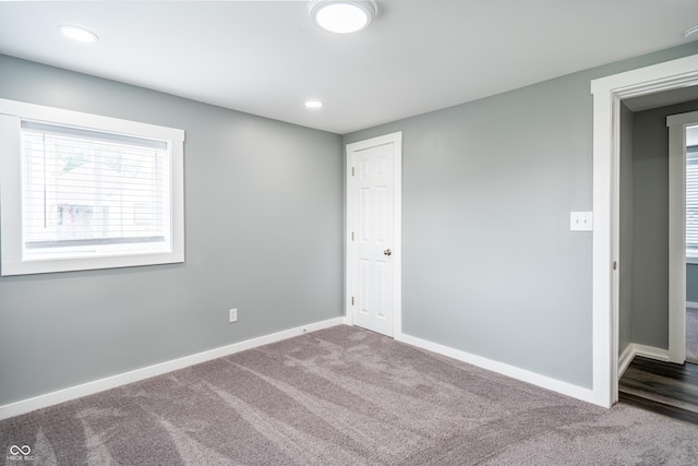 1631 Columbia Ave, Indianapolis, IN 46202 - carpeted empty room featuring baseboards and recessed lighting