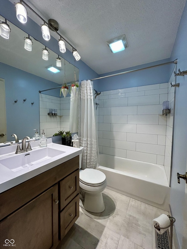 5491 Vin Rose Ln, Lawrence, IN 46226 - full bath featuring vanity, shower / bath combo, a textured ceiling, and toilet