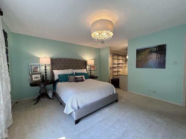 5491 Vin Rose Ln, Lawrence, IN 46226 - carpeted bedroom featuring a chandelier and baseboards