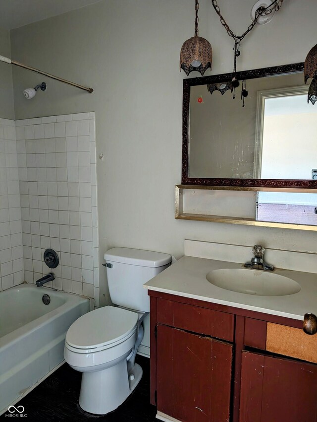 6322 Commons Dr, Indianapolis, IN 46254 - bathroom featuring vanity, toilet, and shower / tub combination
