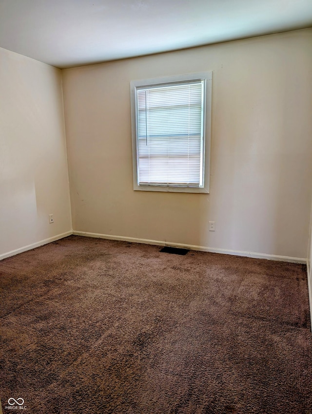6322 Commons Dr, Indianapolis, IN 46254 - carpeted spare room with baseboards