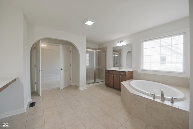 15201 Slateford Rd, Noblesville, IN 46062 - bathroom featuring vanity, a shower stall, a bath, and tile patterned flooring