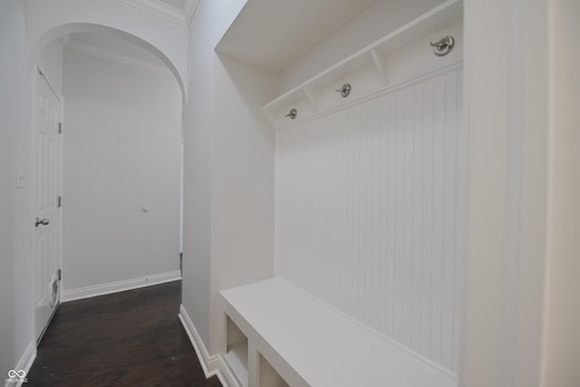 15201 Slateford Rd, Noblesville, IN 46062 - mudroom with dark wood-type flooring, crown molding, arched walkways, and baseboards