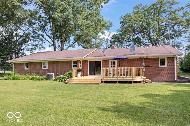 3459 E 650 N, Windfall, IN 46076 - rear view of property with a deck, a yard, brick siding, and a chimney