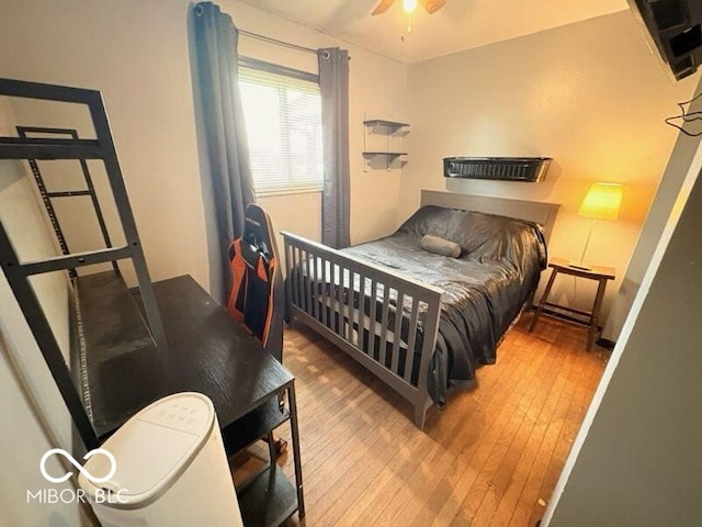8990 N 850 W, Fairland, IN 46126 - bedroom featuring wood-type flooring and ceiling fan