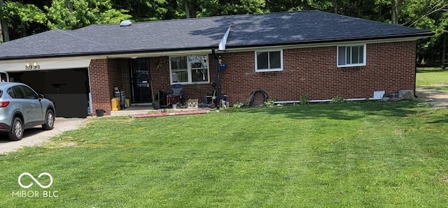 8990 N 850 W, Fairland, IN 46126 - single story home featuring brick siding, an attached garage, and a front lawn