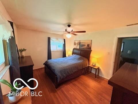 8990 N 850 W, Fairland, IN 46126 - bedroom featuring wood finished floors and a ceiling fan