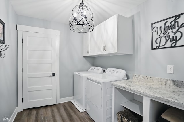 6882 Bladstone Rd, Noblesville, IN 46062 - washroom featuring cabinet space, a chandelier, dark wood-style flooring, independent washer and dryer, and baseboards