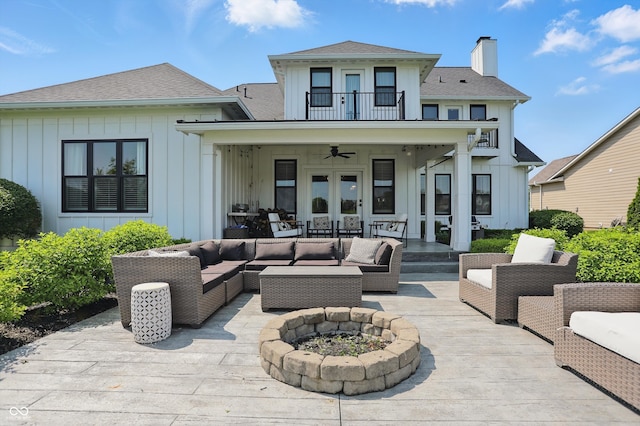 6882 Bladstone Rd, Noblesville, IN 46062 - view of patio featuring a balcony, an outdoor living space with a fire pit, ceiling fan, and french doors