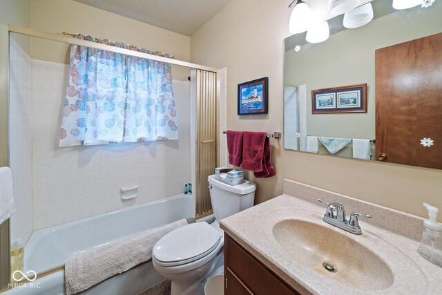 8818 N 1132 W, Monticello, IN 47960 - bathroom featuring vanity, toilet, and shower / tub combination