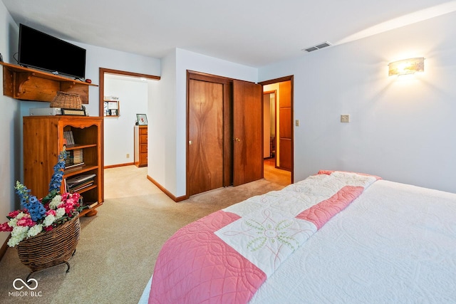 8818 N 1132 W, Monticello, IN 47960 - bedroom with light carpet, a closet, and baseboards