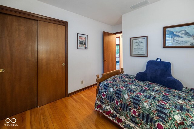 8818 N 1132 W, Monticello, IN 47960 - bedroom featuring light wood-type flooring, a closet, and baseboards